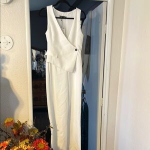 - Zara White Tailored Jumpsuit with V-Neckline